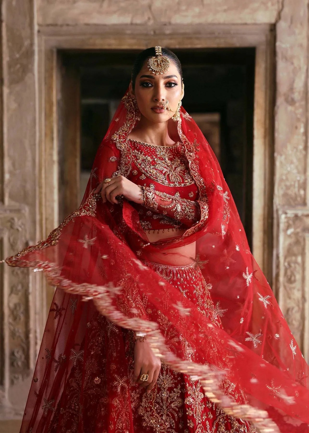 Pakistani Bridal Dress in Red Choli and Lehenga Style