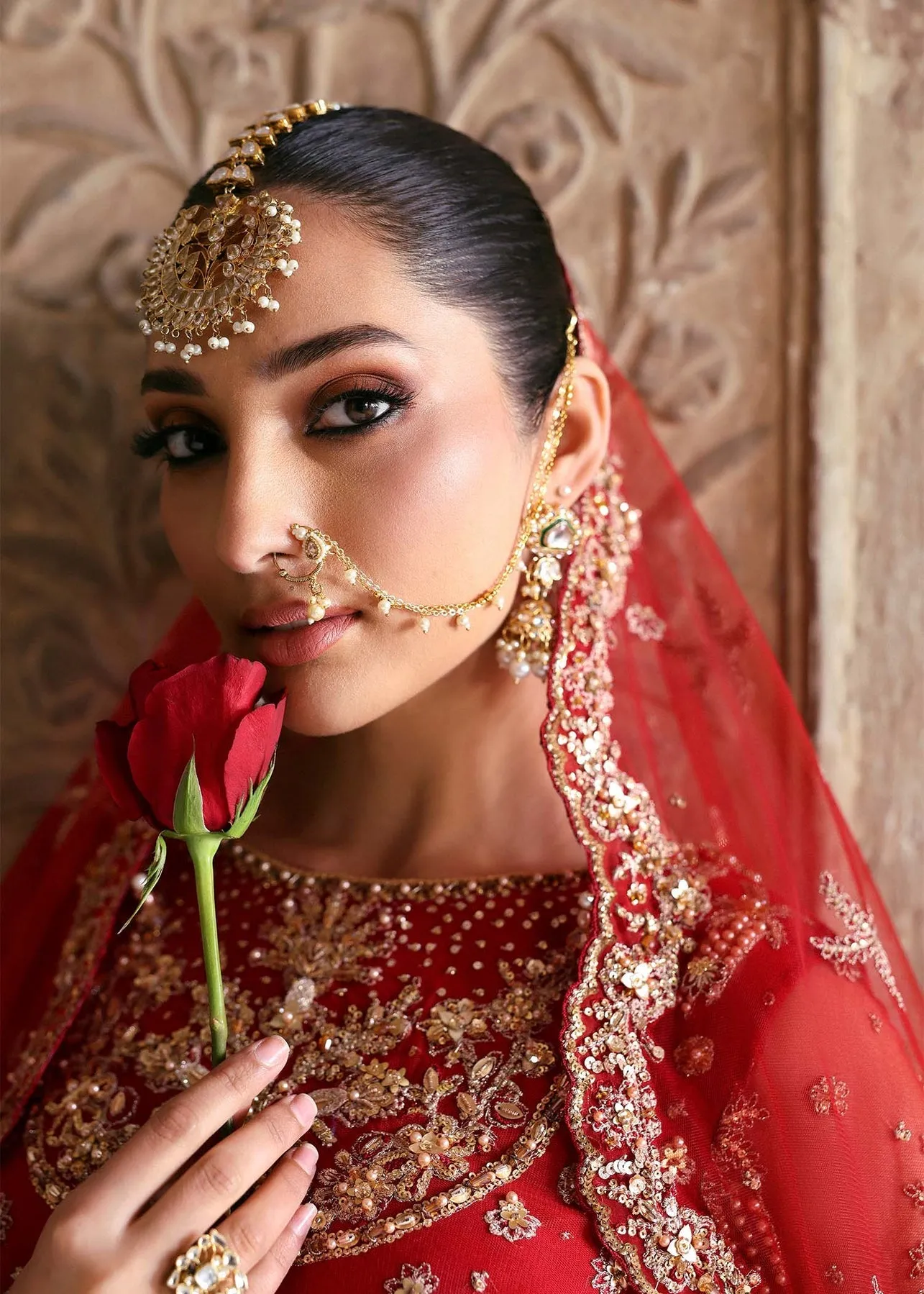 Pakistani Bridal Dress in Red Choli and Lehenga Style