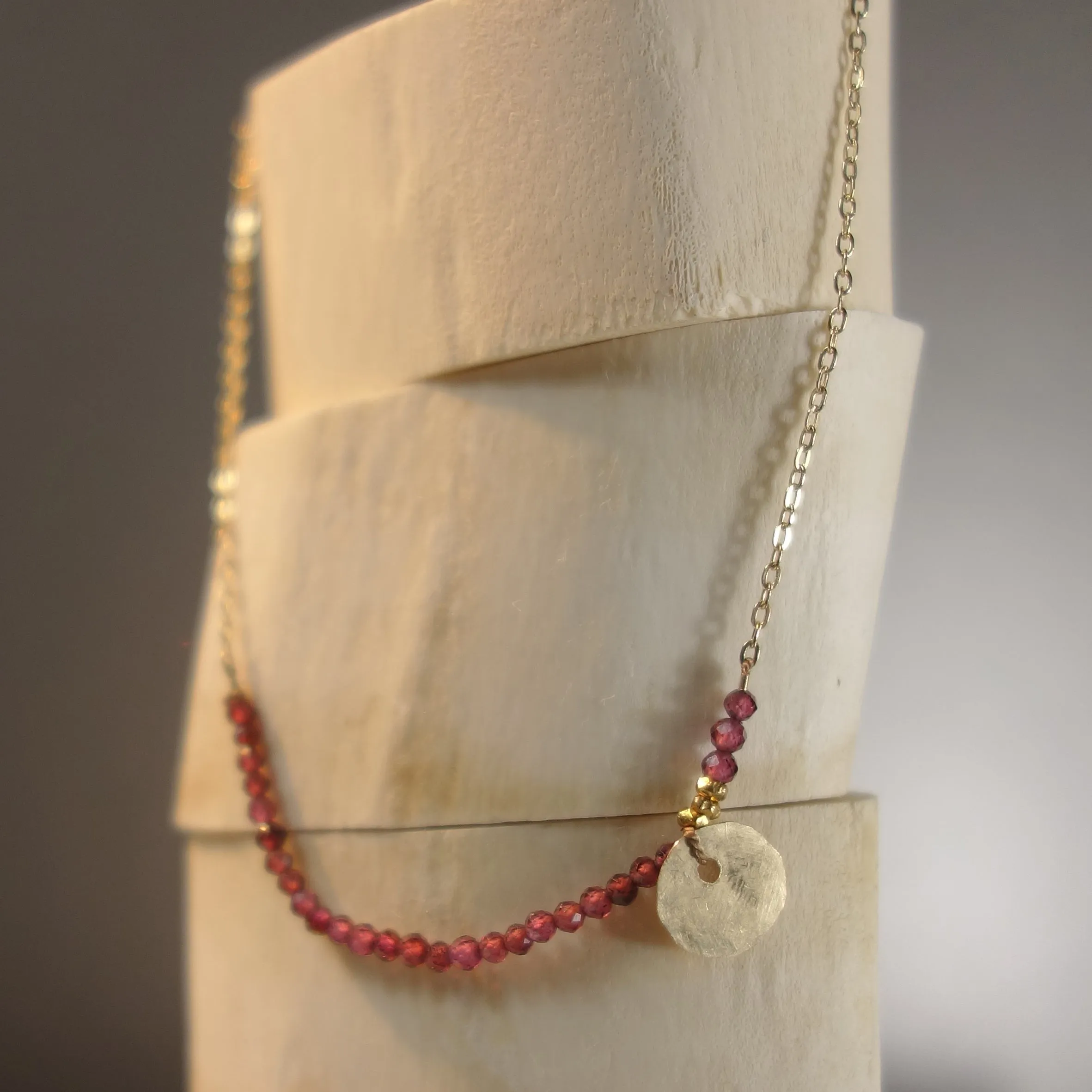 She Spoke Without Words (garnet and gold necklace)