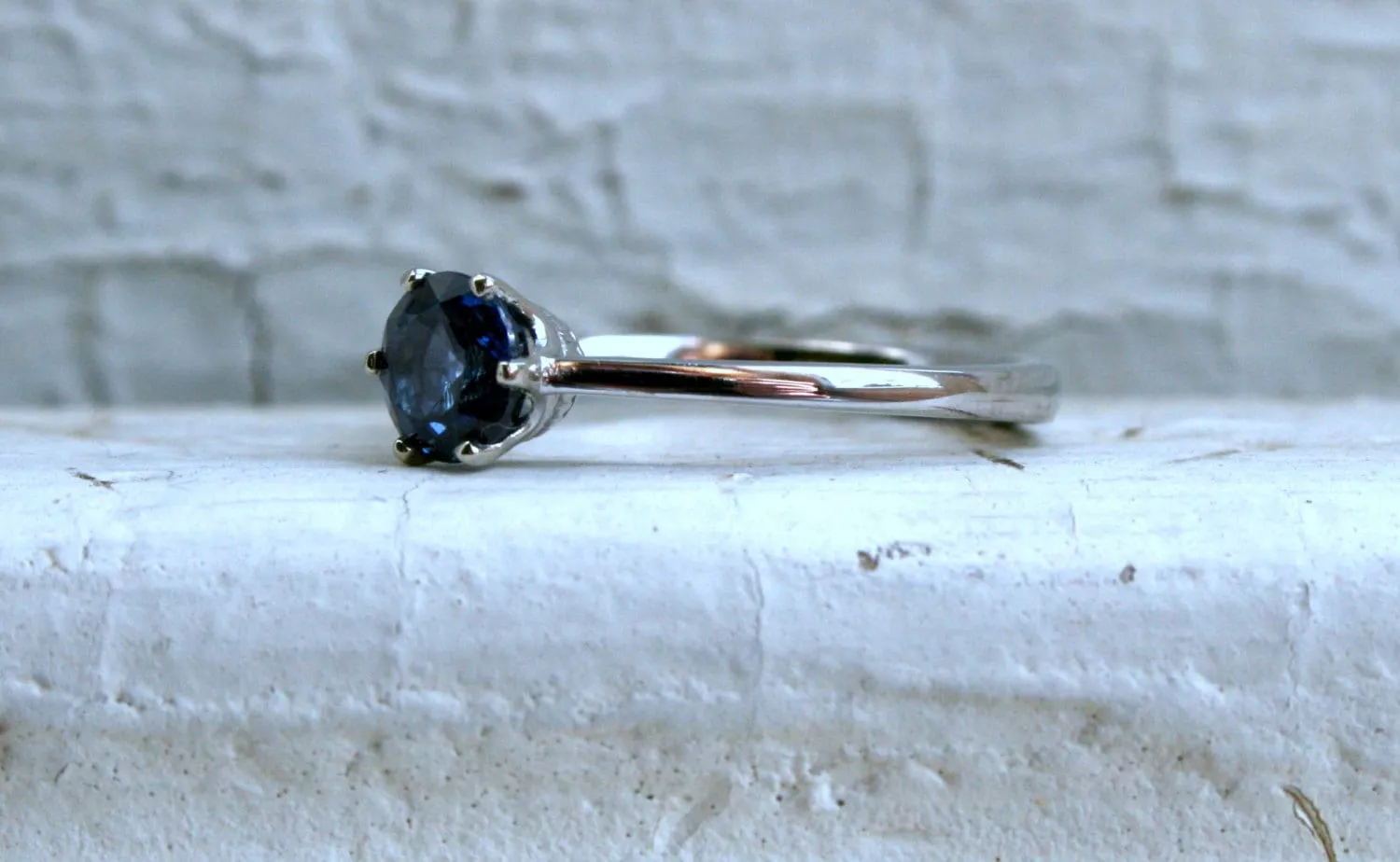 Stunning Sapphire Solitaire in 14K White Gold.