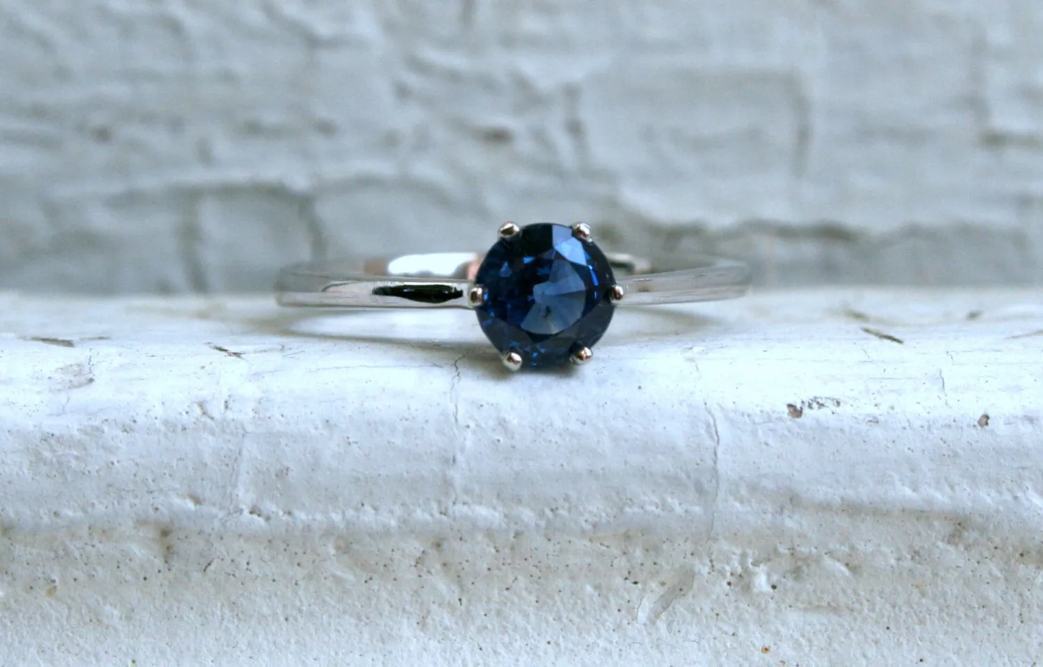 Stunning Sapphire Solitaire in 14K White Gold.
