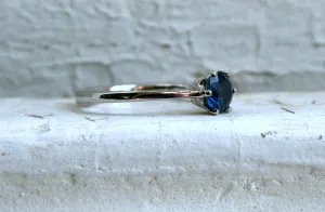 Stunning Sapphire Solitaire in 14K White Gold.