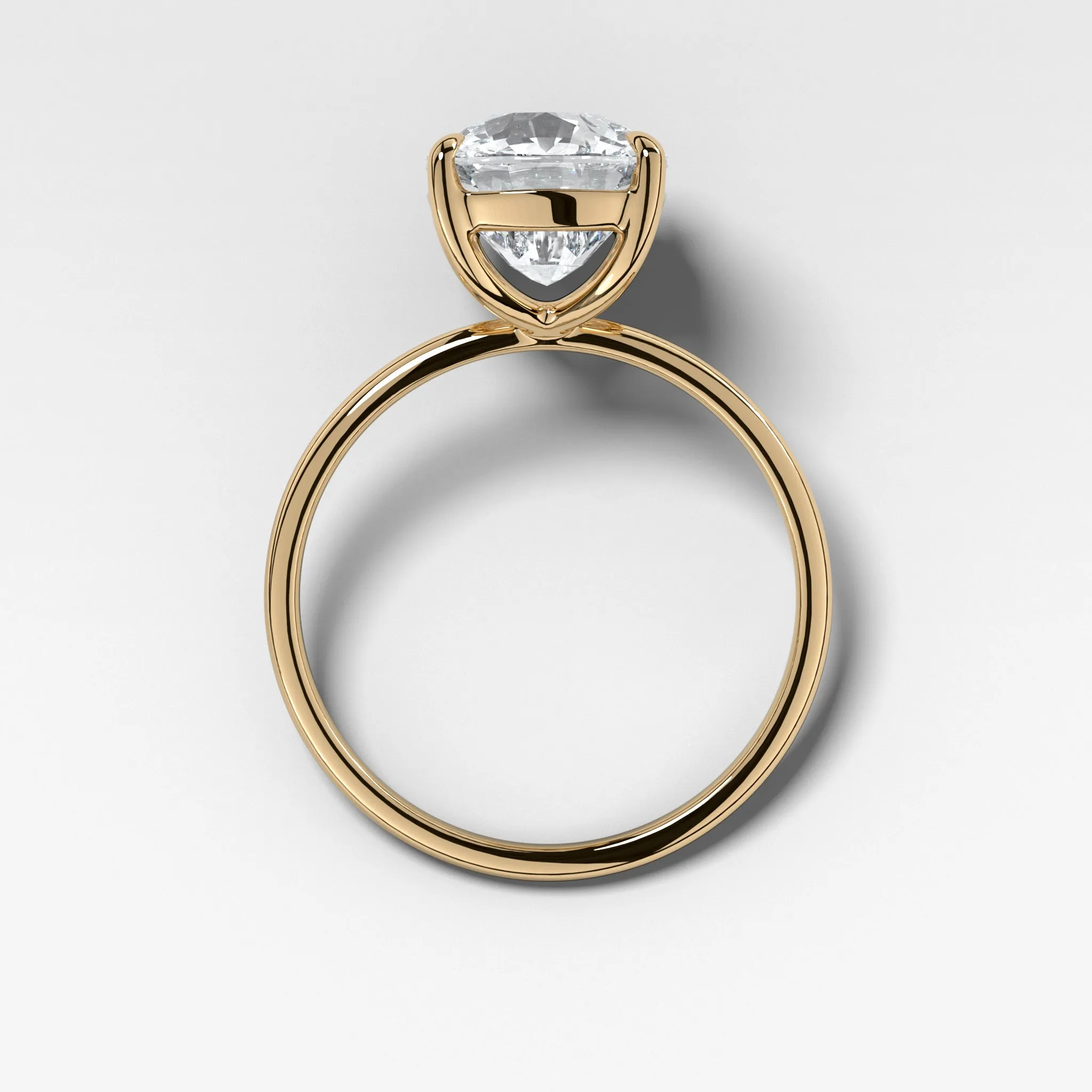 Thin   Simple Solitaire Engagement Ring With Elongated Cushion Cut Diamond