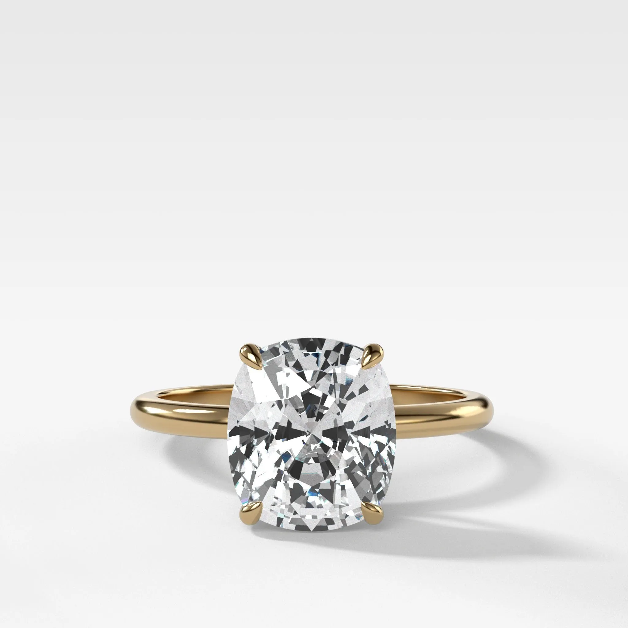 Thin   Simple Solitaire Engagement Ring With Elongated Cushion Cut Diamond