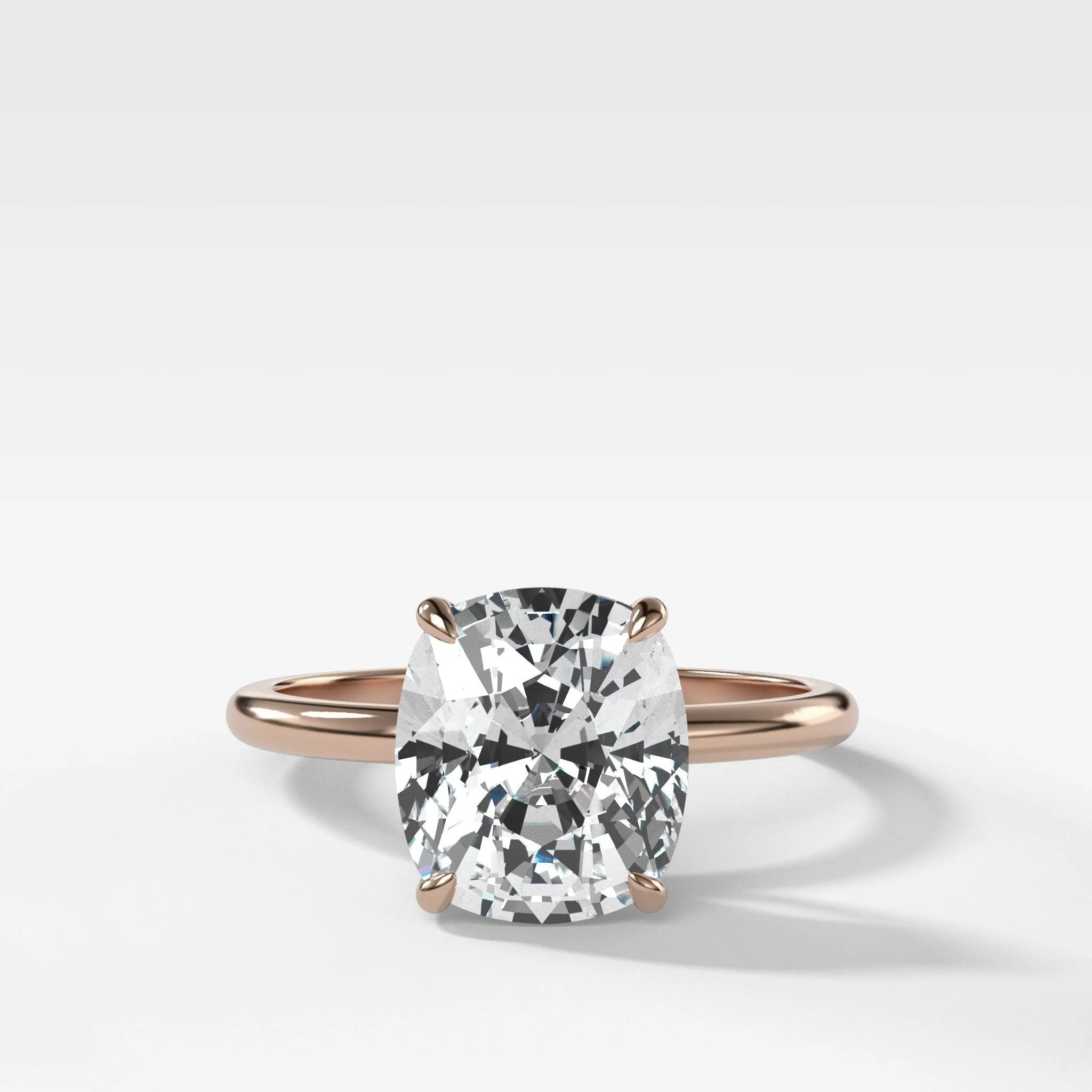 Thin   Simple Solitaire Engagement Ring With Elongated Cushion Cut Diamond